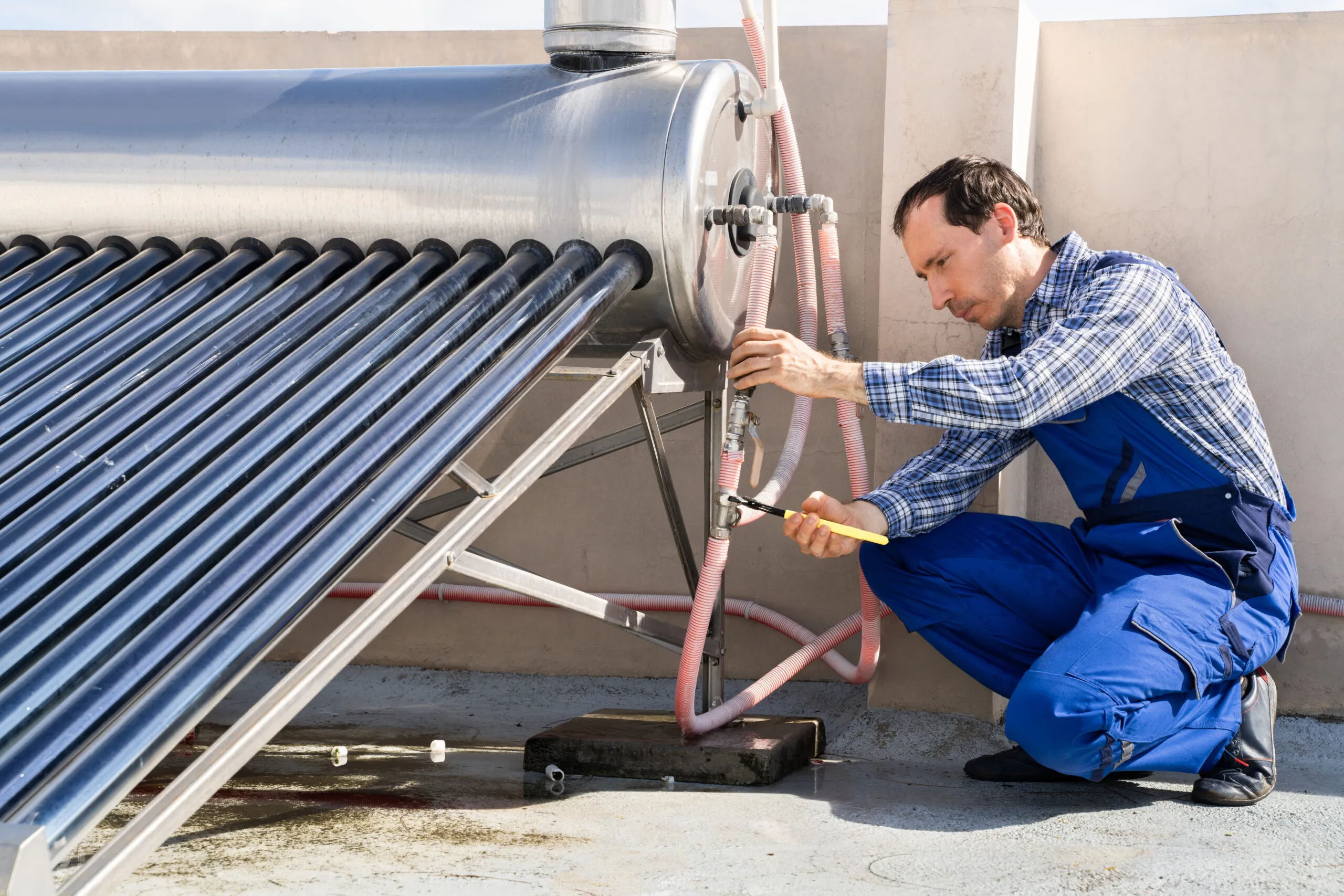 Technician working on Solar water Heater